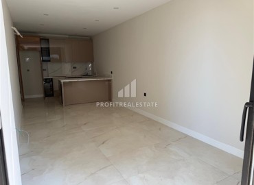 Новая элитная недвижимость в центре Алании, в 450м от моря: апартаменты с одной спальней, 55м², без мебели ID-18425 фото-2