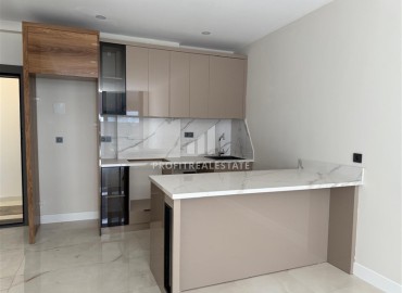 Новая элитная недвижимость в центре Алании, в 450м от моря: апартаменты с одной спальней, 55м², без мебели ID-18425 фото-3