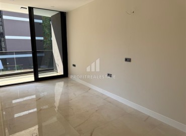 Новая элитная недвижимость в центре Алании, в 450м от моря: апартаменты с одной спальней, 55м², без мебели ID-18425 фото-5