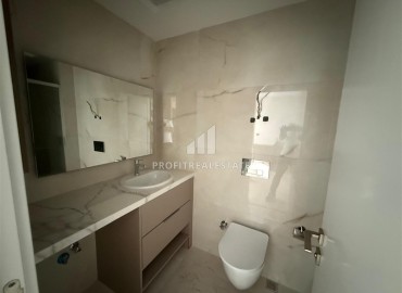 Новая элитная недвижимость в центре Алании, в 450м от моря: апартаменты с одной спальней, 55м², без мебели ID-18425 фото-8