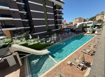 Новая элитная недвижимость в центре Алании, в 450м от моря: апартаменты с одной спальней, 55м², без мебели ID-18425 фото-10