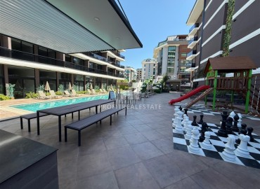 Новая элитная недвижимость в центре Алании, в 450м от моря: апартаменты с одной спальней, 55м², без мебели ID-18425 фото-12