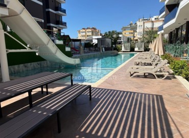 Новая элитная недвижимость в центре Алании, в 450м от моря: апартаменты с одной спальней, 55м², без мебели ID-18425 фото-14