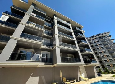 Новые апартаменты 1+1, 50м², с чистовой отделкой в новом комплексе с бассейном в Авсалларе, Алания ID-18427 фото-1