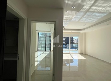 Квартира с одной спальней, 54м², в элитной резиденции в Махмутларе, в 750м от моря, Алания ID-18433 фото-7