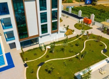 Квартира с одной спальней, 54м², в элитной резиденции в Махмутларе, в 750м от моря, Алания ID-18433 фото-15