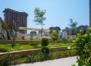 Квартира с одной спальней, 54м², в элитной резиденции в Махмутларе, в 750м от моря, Алания ID-18433 фото-17