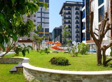 Квартира с одной спальней, 54м², в элитной резиденции в Махмутларе, в 750м от моря, Алания ID-18433 фото-18