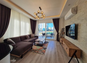 Уютные апартаменты с одной спальней, 50м², в резиденции с хорошей инфраструктурой в 300м от моря в Махмутларе, Алания ID-18438 фото-5