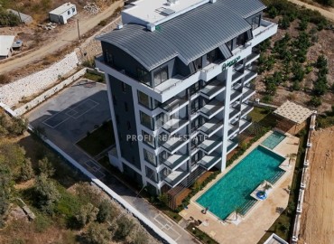Квартиры 1+1, 2+1, 48-98м², в комплексе на этапе строительства в районе Алании – Демирташ, Алания ID-14143 фото-2