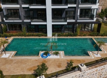 Квартиры 1+1, 2+1, 48-98м², в комплексе на этапе строительства в районе Алании – Демирташ, Алания ID-14143 фото-5