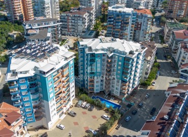 Стильная квартира с двумя спальнями, 115м², в комплексе с хорошей инфраструктурой в районе Алании Тосмур ID-18451 фото-1