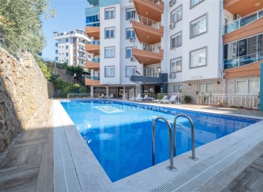 Стильная квартира с двумя спальнями, 115м², в комплексе с хорошей инфраструктурой в районе Алании Тосмур ID-18451 фото-2