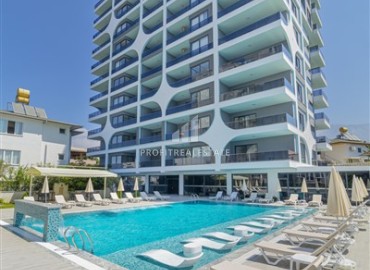 Элегантные двухкомнатные апартаменты, 60м², в комплексе с отельной инфраструктурой в Махмутларе, Алания ID-18455 фото-1