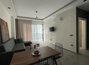 Элегантные двухкомнатные апартаменты, 60м², в комплексе с отельной инфраструктурой в Махмутларе, Алания ID-18455 фото-2