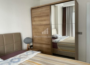 Элегантные двухкомнатные апартаменты, 60м², в комплексе с отельной инфраструктурой в Махмутларе, Алания ID-18455 фото-3