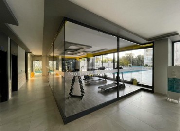 Элегантные двухкомнатные апартаменты, 60м², в комплексе с отельной инфраструктурой в Махмутларе, Алания ID-18455 фото-7