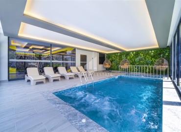 Элегантные двухкомнатные апартаменты, 60м², в комплексе с отельной инфраструктурой в Махмутларе, Алания ID-18455 фото-9