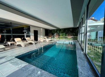 Элегантные двухкомнатные апартаменты, 60м², в комплексе с отельной инфраструктурой в Махмутларе, Алания ID-18455 фото-10