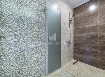 Элегантные двухкомнатные апартаменты, 60м², в комплексе с отельной инфраструктурой в Махмутларе, Алания ID-18455 фото-13