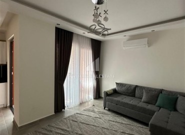 Стильная квартира 1+1, 50м², в комплексе премиум класса с отличной локацией в центре Махмутлара, Алания ID-18456 фото-2