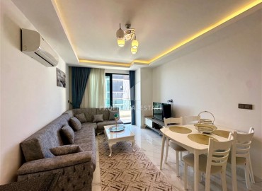 Видовая двухкомнатная меблированная квартира 60м² в новой резиденции в центре Махмутлара, Алания ID-18460 фото-4