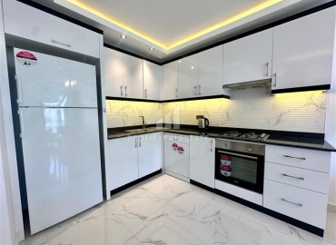 Видовая двухкомнатная меблированная квартира 60м² в новой резиденции в центре Махмутлара, Алания ID-18460 фото-6