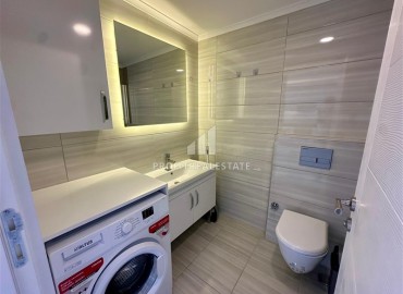 Видовая двухкомнатная меблированная квартира 60м² в новой резиденции в центре Махмутлара, Алания ID-18460 фото-11