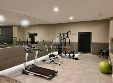 Видовая двухкомнатная меблированная квартира 60м² в новой резиденции в центре Махмутлара, Алания ID-18460 фото-16