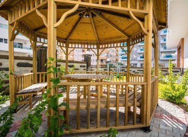 Укомплектованные апартаменты 1+1, 66м², в элитной резиденции в 300м от моря в районе Махмутлар, Алания ID-18467 фото-16