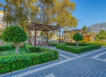 Трехкомнатная квартира, 80м², с видом на горы, в комплексе с бассейном у моря в Махмутларе, Алания. ID-18468 фото-18