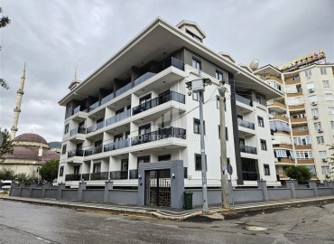 Апартаменты с одной спальней, 68м², с чистовой отделкой в новом проекте c инфраструктурой в центре Алании, у пляжа Клеопатры ID-18469 фото-1