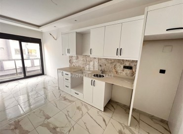 Апартаменты с одной спальней, 68м², с чистовой отделкой в новом проекте c инфраструктурой в центре Алании, у пляжа Клеопатры ID-18469 фото-2