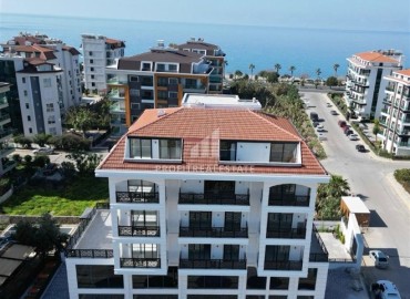 Двухкомнатная квартира, 60м², в новом комплексе с бассейном в Кестеле, Алания, в 200 метрах от моря ID-18472 фото-1