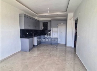 Апартаменты с одной спальней, 55м², в новом комплексе с отельной инфраструктурой и частным пляжем в районе Алании - Демирташ ID-18474 фото-2