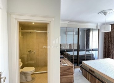 Видовая квартира с двумя спальнями, 110м², в комплексе с инфраструктурой в районе Тосмур, Алания. ID-18475 фото-10