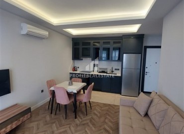 Арендовать новую квартиру  в новом комплексе премиум класса на первой береговой линии в центре Алании ID-18480 фото-2