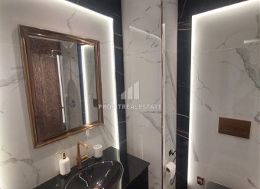 Арендовать новую квартиру  в новом комплексе премиум класса на первой береговой линии в центре Алании ID-18480 фото-8