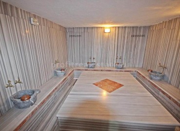 Апартаменты с одной спальней по низкой стоимости в комплексе с зеленым садом и бассейном! в Махмутларе, Алания, 75 кв.м. ID-1448 фото-11
