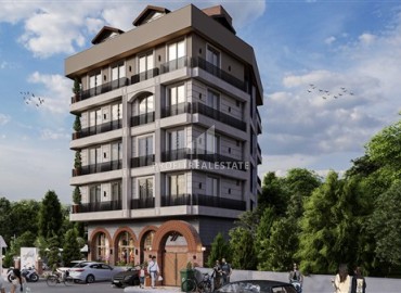 Трехкомнатные квартиры с отдельной кухней, 100м², в доме с парковкой на начальном этапе строительства в центре Алании ID-18486 фото-4