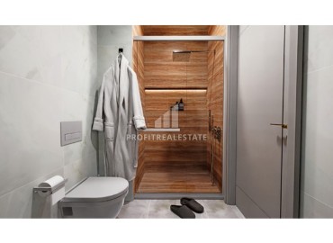 Трехкомнатные квартиры с отдельной кухней, 100м², в доме с парковкой на начальном этапе строительства в центре Алании ID-18486 фото-14