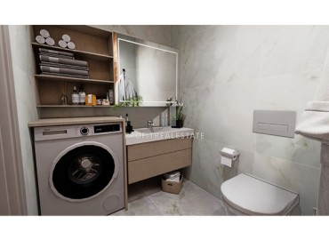 Трехкомнатные квартиры с отдельной кухней, 100м², в доме с парковкой на начальном этапе строительства в центре Алании ID-18486 фото-15