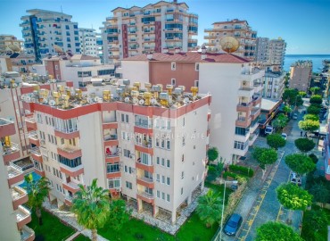 Недорогая вторичная недвижимость: квартира 1+1, 60м², с ремонтом и новой мебелью в 200м от моря в Махмутларе, Алания ID-18488 фото-1