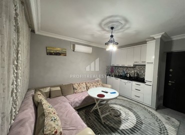Недорогая вторичная недвижимость: квартира 1+1, 60м², с ремонтом и новой мебелью в 200м от моря в Махмутларе, Алания ID-18488 фото-4