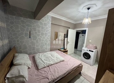 Недорогая вторичная недвижимость: квартира 1+1, 60м², с ремонтом и новой мебелью в 200м от моря в Махмутларе, Алания ID-18488 фото-9