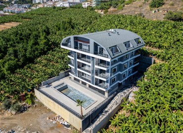 Новая недвижимость в центре Алании, в 500м от моря: апартаменты с одной спальней, 55м², без мебели ID-18489 фото-2