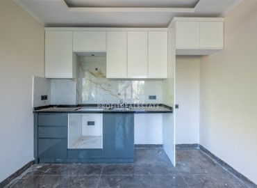 Новая недвижимость в центре Алании, в 500м от моря: апартаменты с одной спальней, 55м², без мебели ID-18489 фото-5