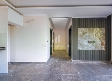 Новая недвижимость в центре Алании, в 500м от моря: апартаменты с одной спальней, 55м², без мебели ID-18489 фото-8