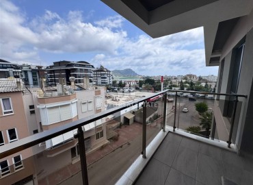 Стильная двухкомнатная квартира 56 м2, с мебелью, в 400 метрах от моря, в центре Аланьи ID-12042 фото-11