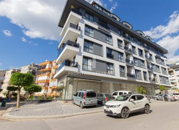 Стильная двухкомнатная квартира, 50м², в новом доме городского типа в центре Алании, 700м от моря ID-18494 фото-1